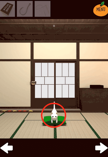 kotatsu_居間_緑色の座布団の上にいる猫を拡大