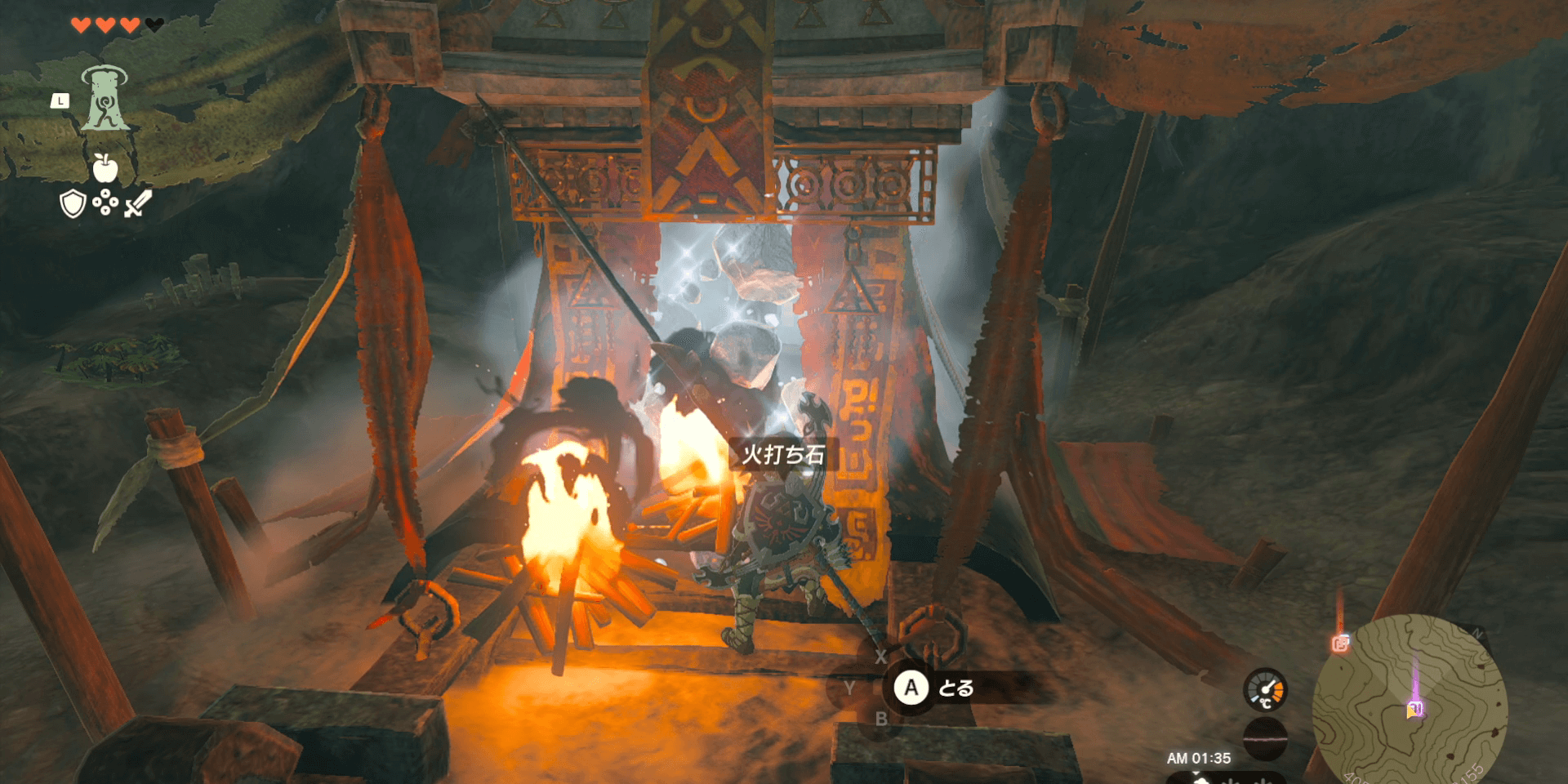 祭壇前の氷を火で溶かす