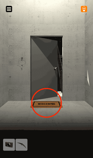 脱出ゲーム非常階段_1階_反対側を向き玄関マットを拡大する